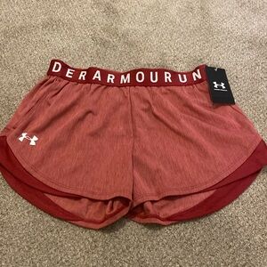 Under Armour red athletic shorts